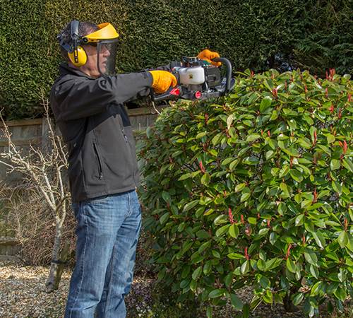 Side view of Webb HC600 Petrol Hedge cutter