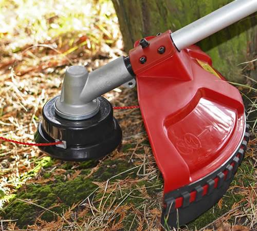 Side view of Cobra BCX370CU Petrol Bike Handle Brush cutter