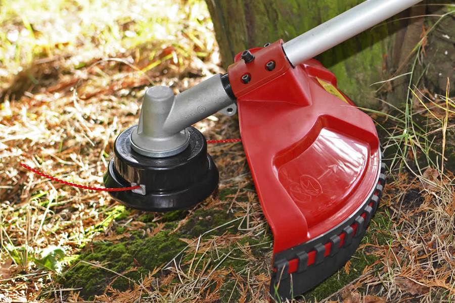 Side view of Cobra MTX230C Petrol Multi-Tool