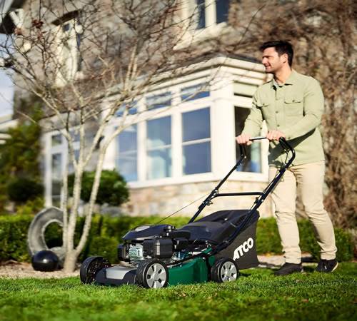 Side view of ATCO Classic Self-Propelled 16S Four Wheel Petrol Lawnmower